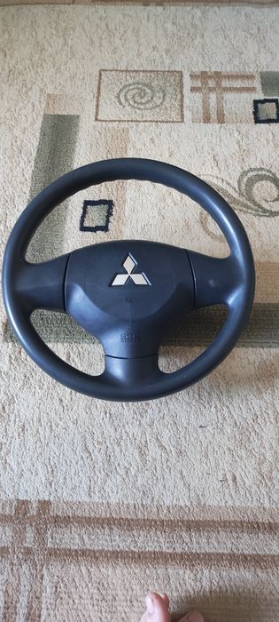Руль Мицубиси Лансер 10