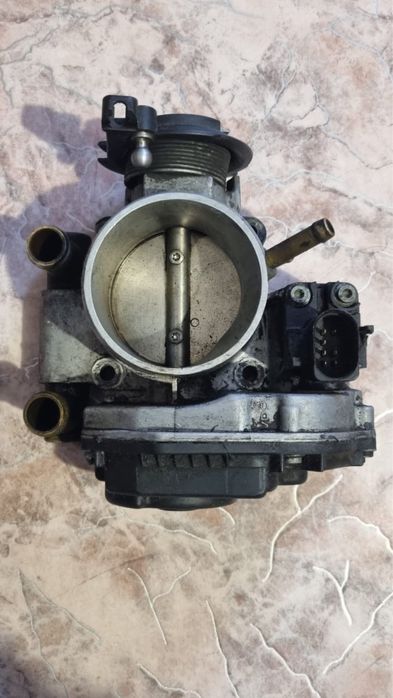 Продам дросельную заслонку passat b5,audi a4