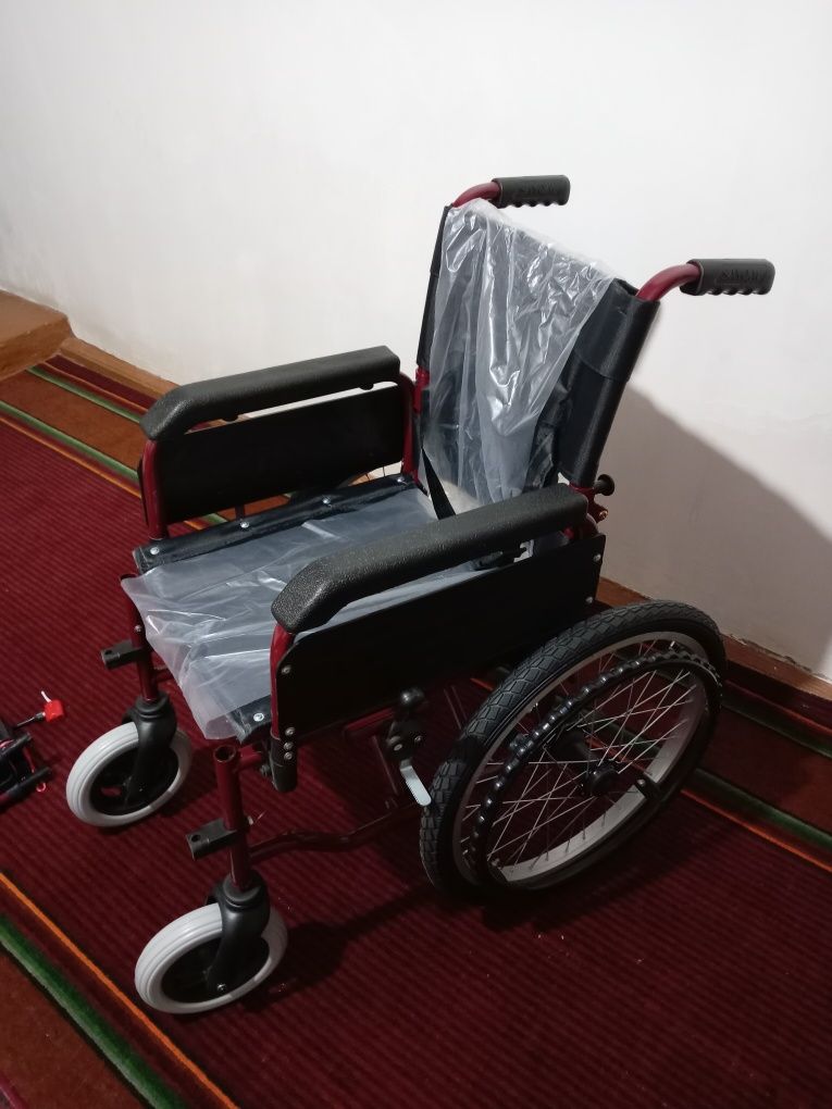 Nogironlar uchun möljallangan bolalar aravachasi