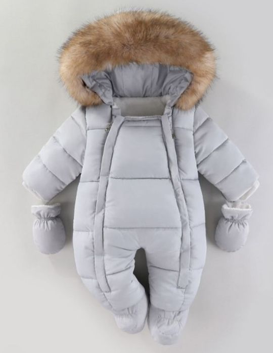 Продам зимний комбинезон.рост  66см