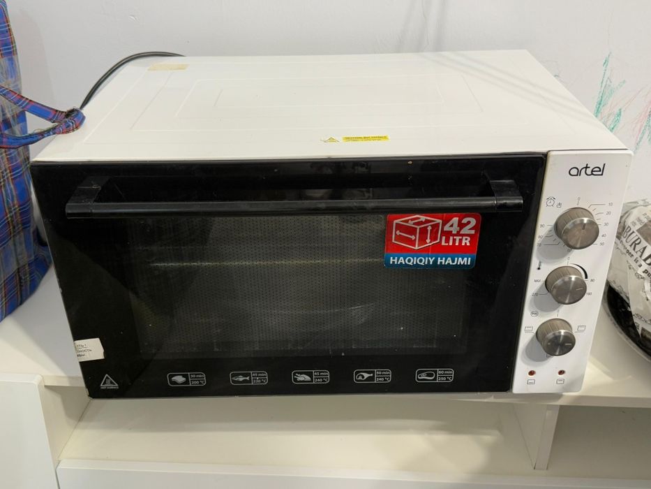 Продам мини духовку.Фирмы Artel.