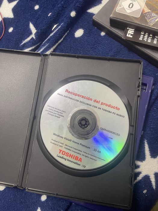 Vand cd de tohsiba de windows vista home premium x86 pe spaniola