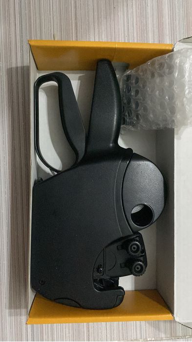 Этикет пистолет