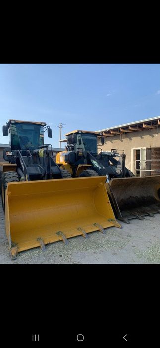 Экскаватор погрузчик хизмати