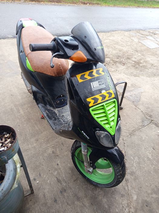 Merge perfect pornire automata și manuala schimb cu scuter electric