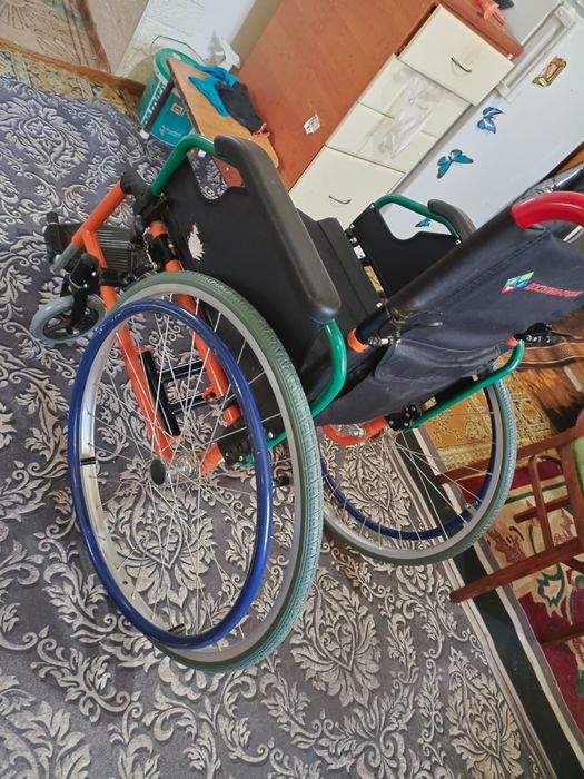 Инвалидная коляска