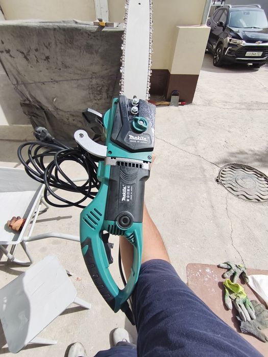 Электрические цепная пила makita