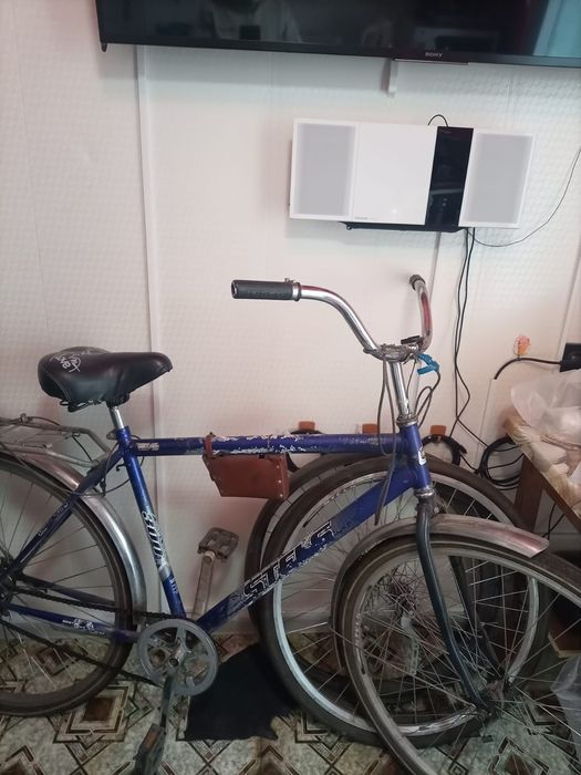 Велосипед STELS с 2-мя запасными колесами