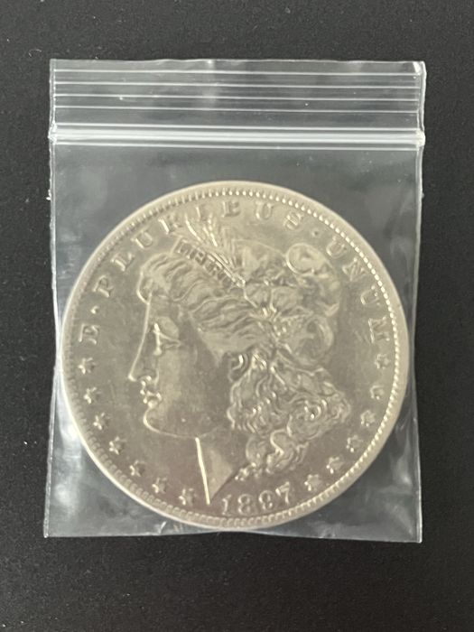 Монеты США, Швеции и Российской империи