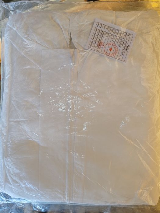 Комбинезон влагостойкий. Маскхалат одноразовый белый.