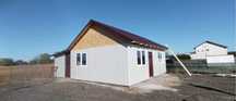 Casa pe structura metalica cu panou sandwich foisoare terase