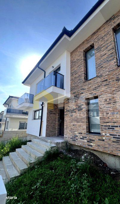 Casa duplex cu 3 dormitoare, 2 bai si curte privata, Floresti