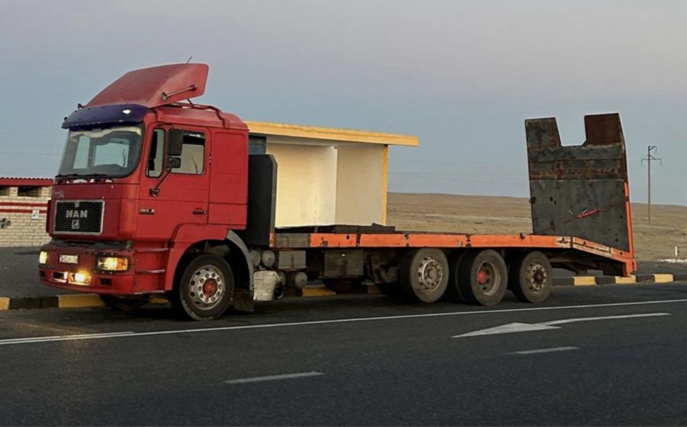 Грузовой эвакуатор или тралл