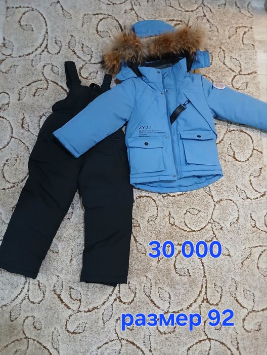 Продам зимний комбинезон и костюм на ребенка