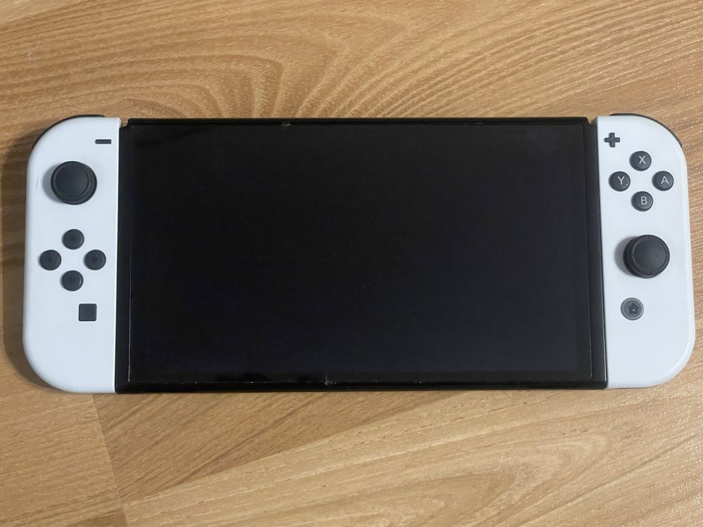 Nintendo switch OLED с подарък игри