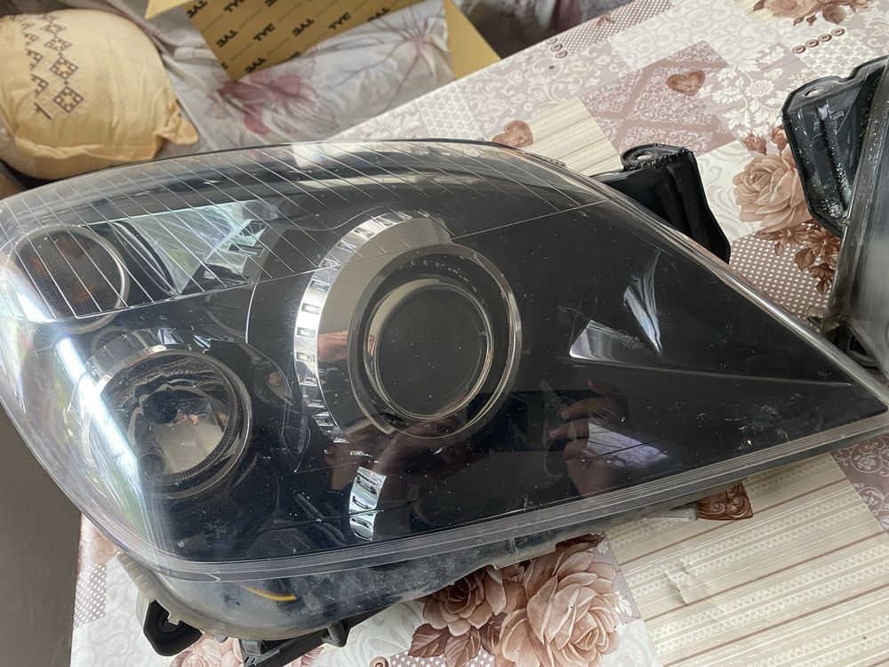 Оригинални завиващи AFL фарове HELLA Astra H