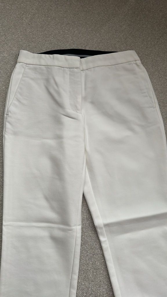 Pantaloni dama albi Zara.