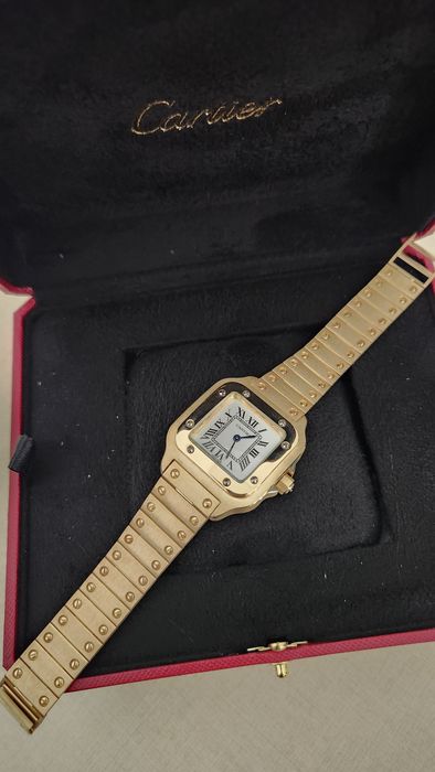 Золотые часы Cartier Santos