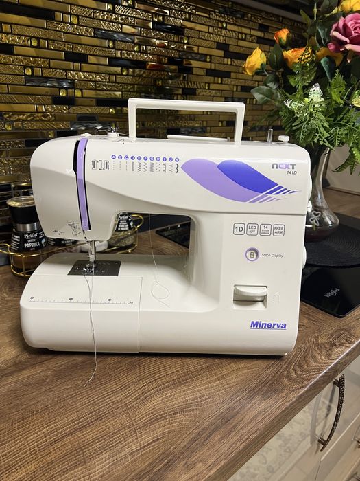 Masina de cusut portabilă electrică