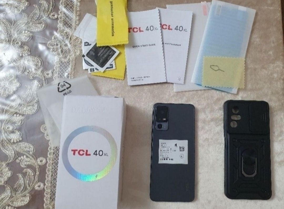 Srochna sotiladi TCL 40XL Orginal Xolati ideal yengide turibdi