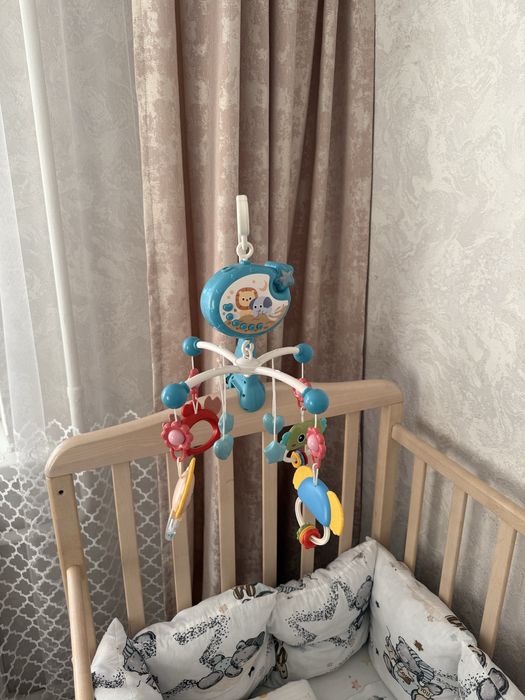 Продам Мобиль в кроватку детский, музыкальный