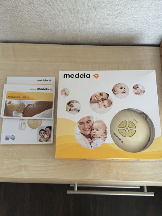 Электрический молокоотсос Medela