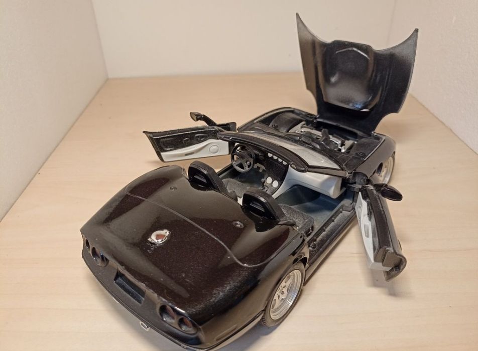 Shelby series1 
Scara 1:18
Bburago 

Pozele reflectă realitatea. Se vi