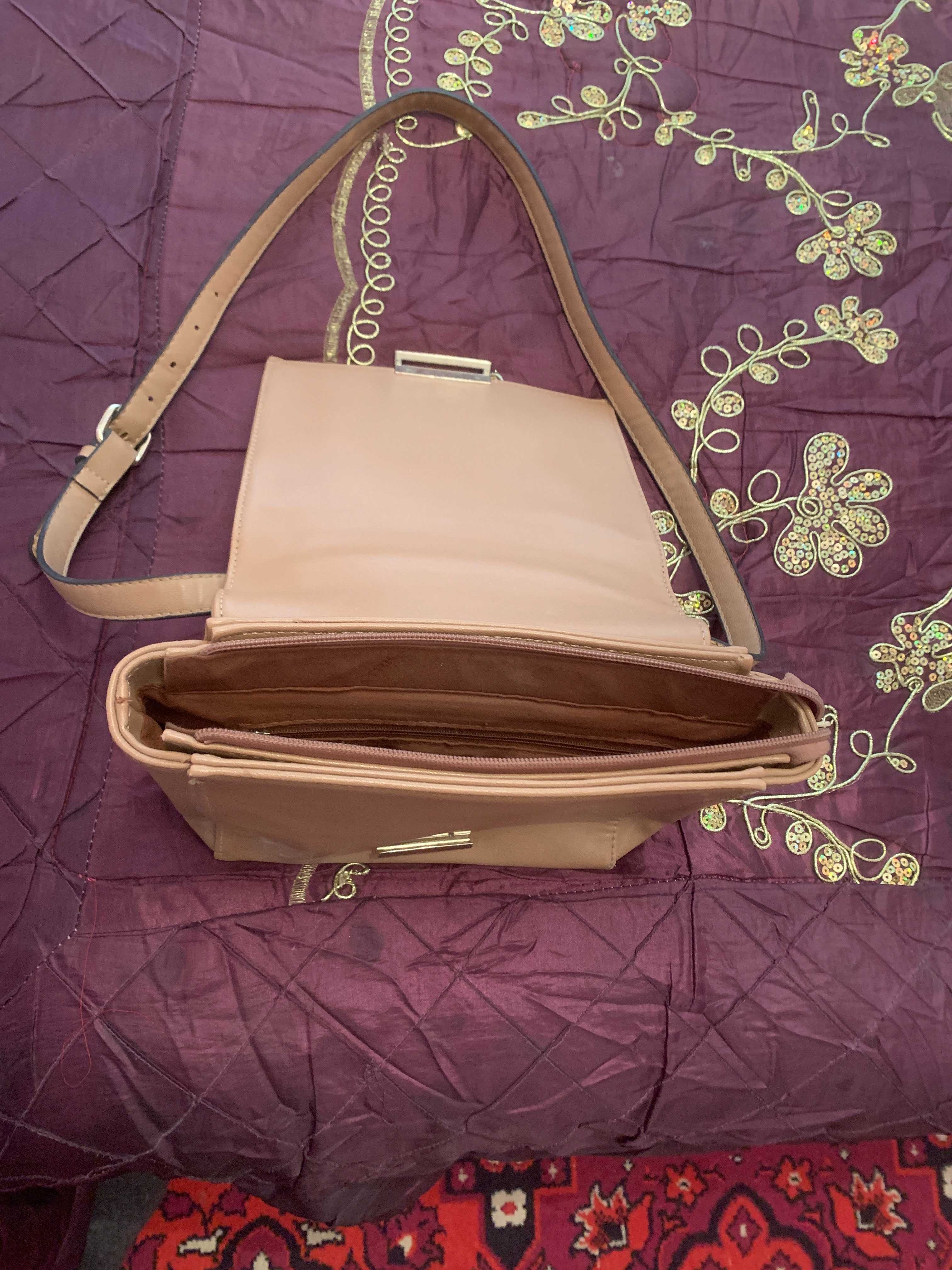 Продам сумочку дамскую из натур. кожи цвета кофе (сделано в Италии)