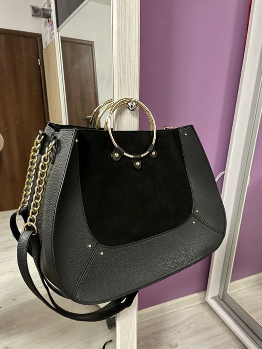 Geanta neagra, de dimensiuni medii spre mari, nefolosita