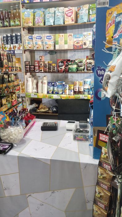 Таййор магазин прадухтаси билан