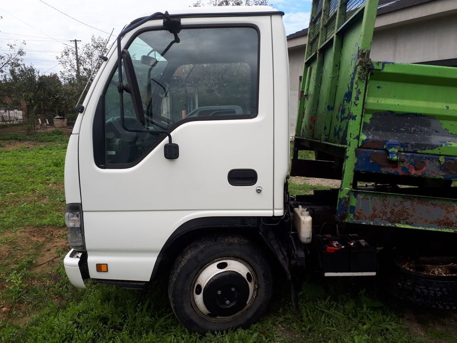 Vand ISUZU NKR basculabil