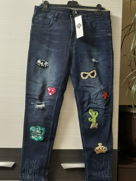 Vând blugi damă,marca TEX