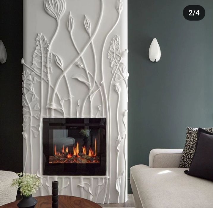 Rassom,Xudojnik,Devorga bo'rtma rasm.