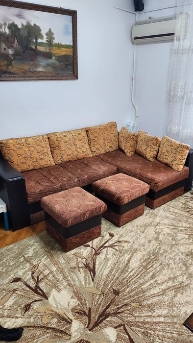 Canapea extensibila cu lada de depozitare