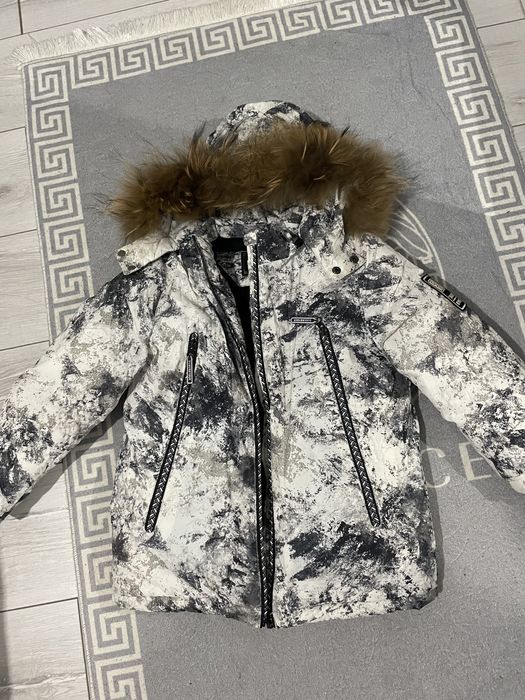 Продам зимний фирменный комбинезон