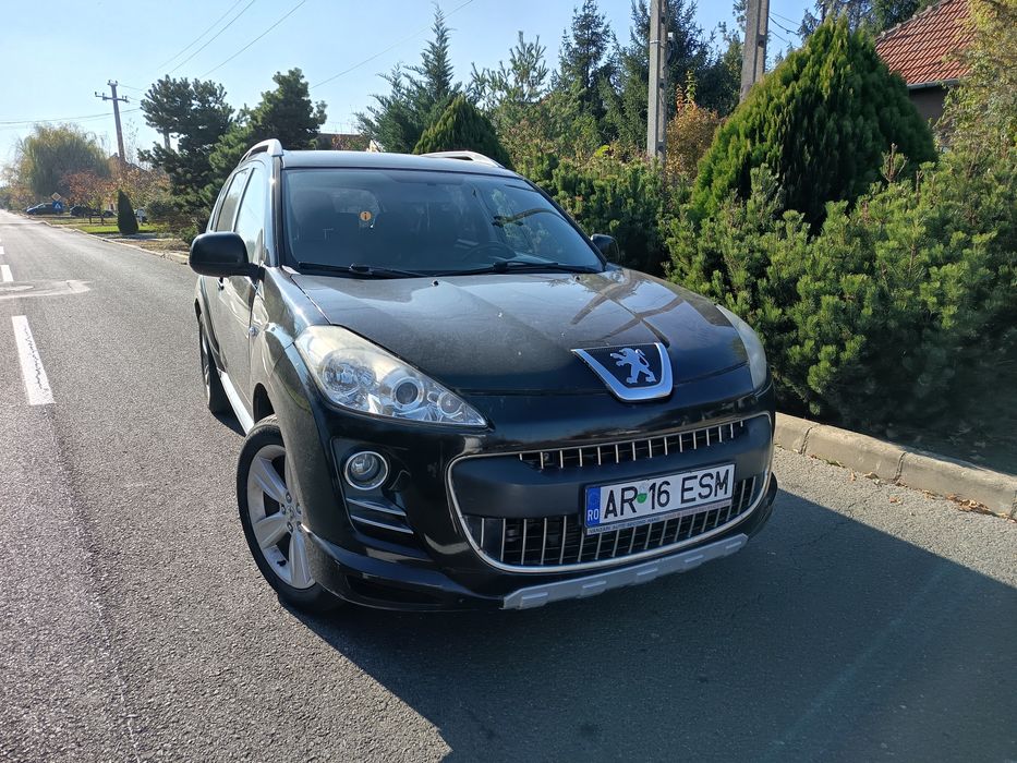 Peugeot 4007 full 4x4 cu 7 locuri