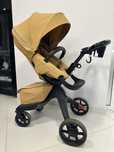 Бебешка количка Stokke® Xplory® X + бебешки кош - цвят Golden Yellow
