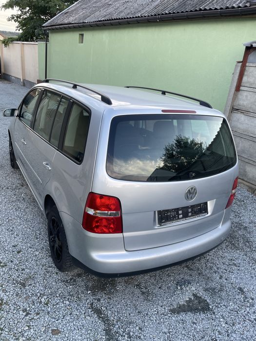 Vw Touran 7 locuri