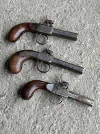 стари капсулни пистолети
