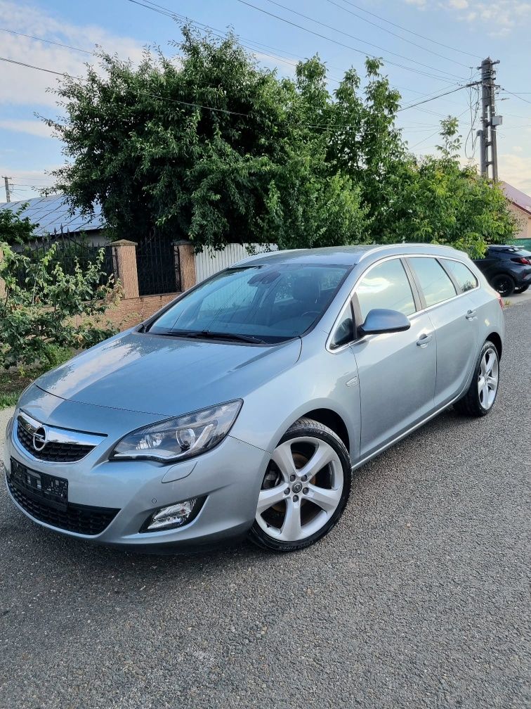 Opel  astra  2,0  Recent   Adus   2012