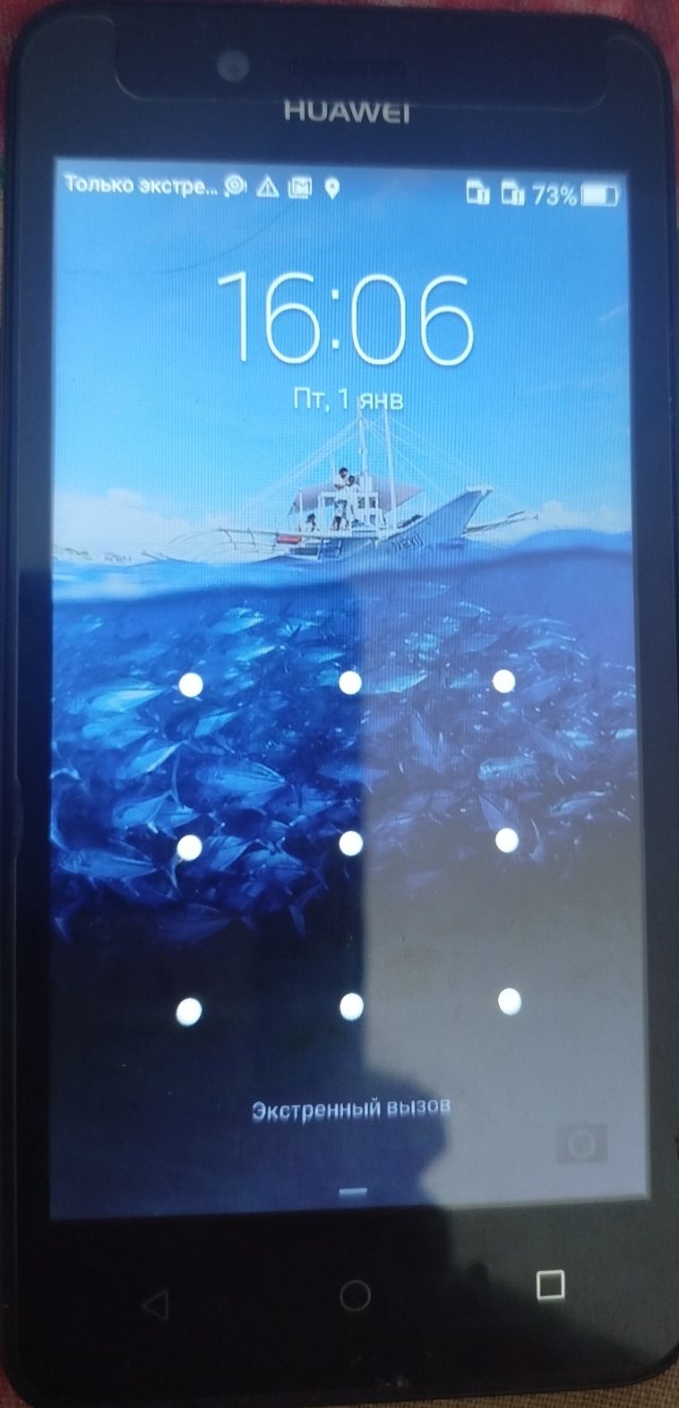 Телефон андроид Хуавей.