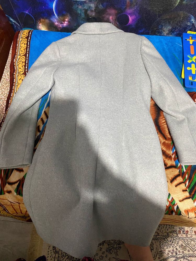 Продам осеннее пальто в отличном состояний.