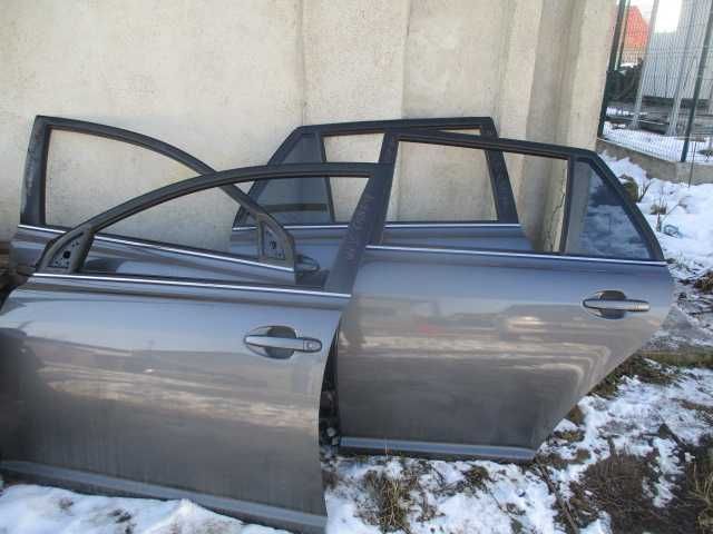 Portiera usa stanga dreapta fata spate Toyota Avensis an 2003-2009
