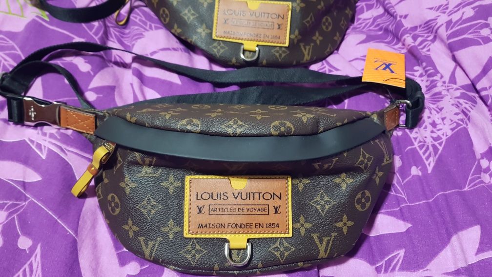 Vand borseta Louis Vuitton