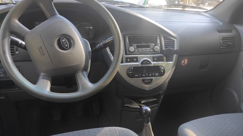 Kia  Carens с газова уредба
