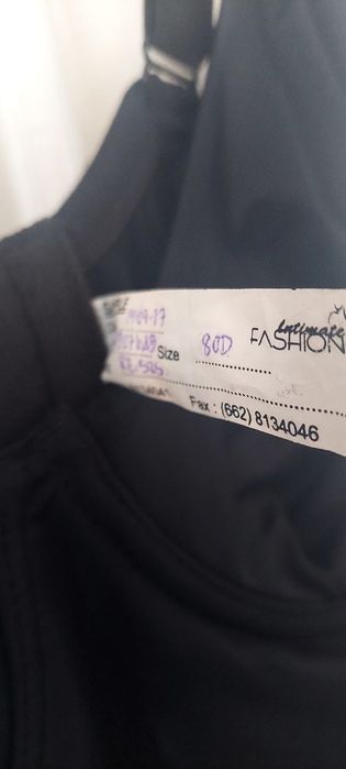 Vând body modelator, negru,elastic, textura deosebita.