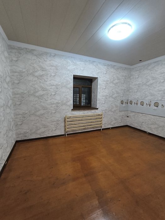 Продается участок с домом в городе Янгиюле.