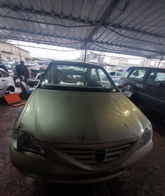 Lampa / Tripla stop stanga pe aripa Dacia Logan prima generatie