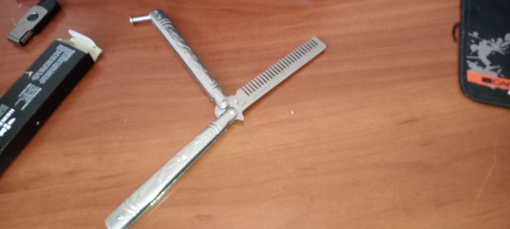 Бабочка расческа