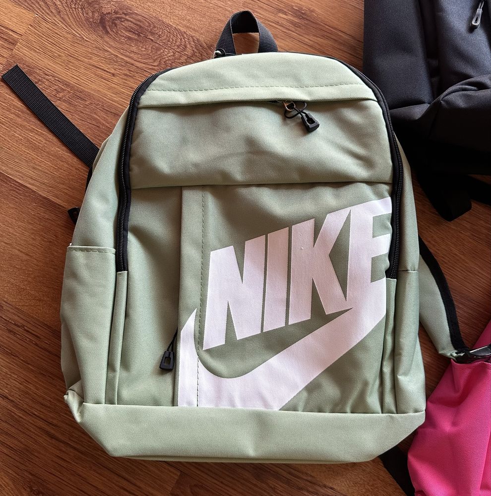 Раници Nike в черно,розово и зелено,подходящи за училище